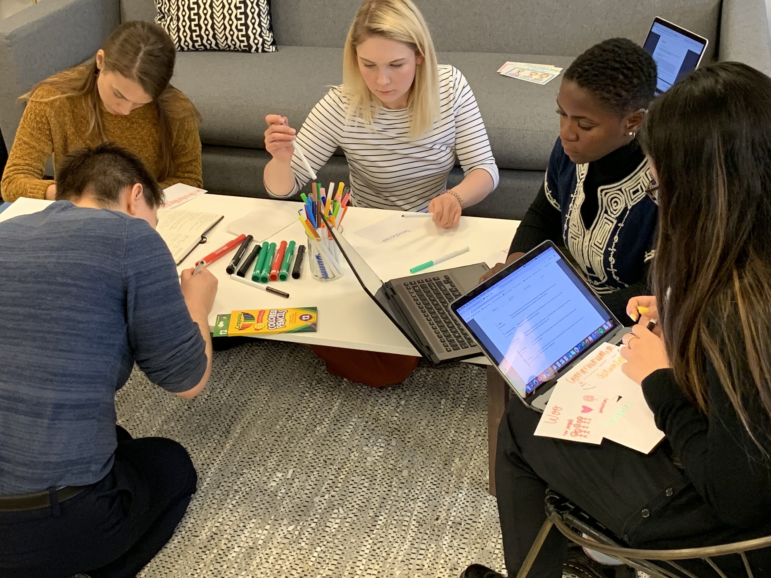 YoVanna works with other fellows during the leadership training retreat.