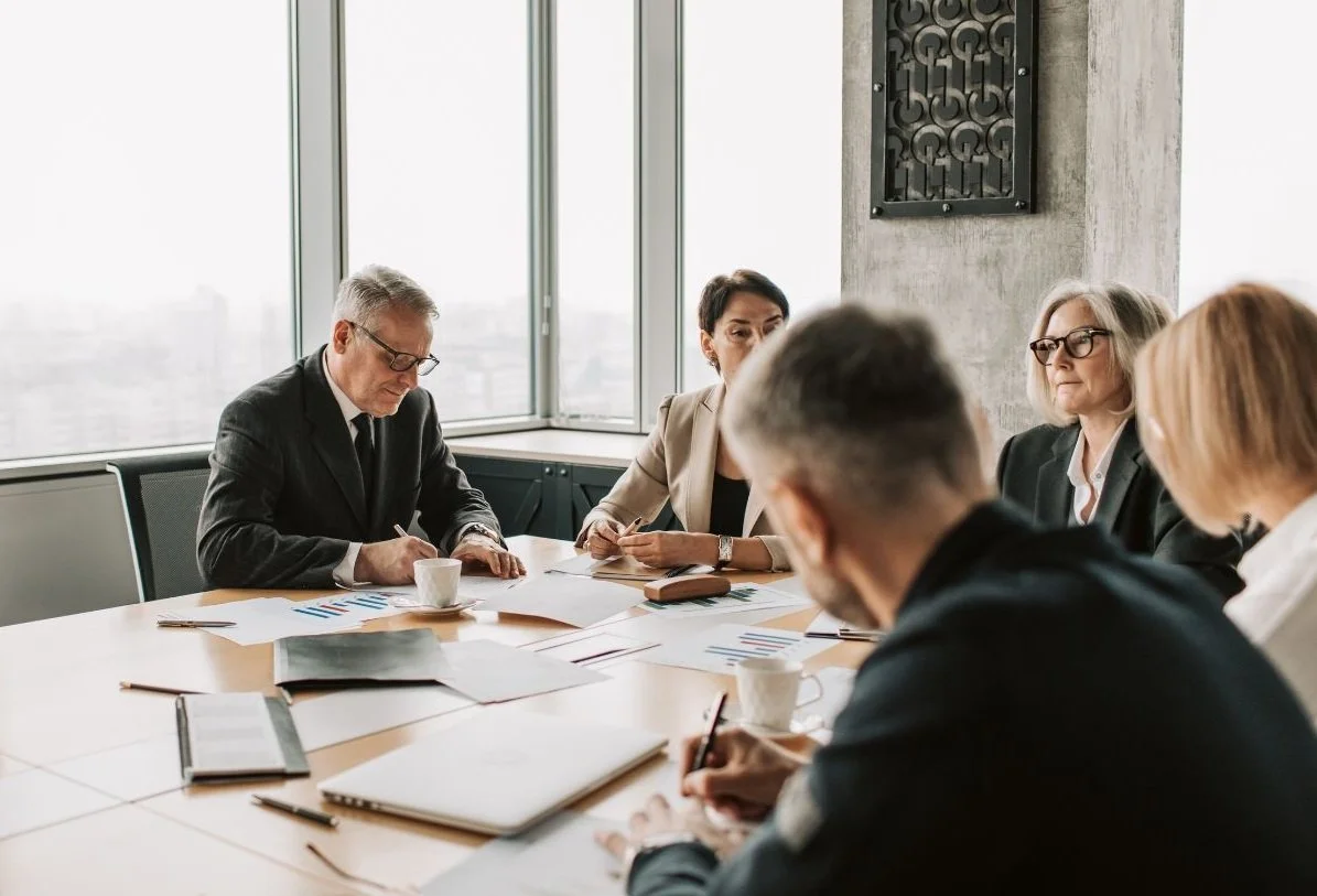 A team meeting is held to run through emergency scenarios and determine how they can improve processes.