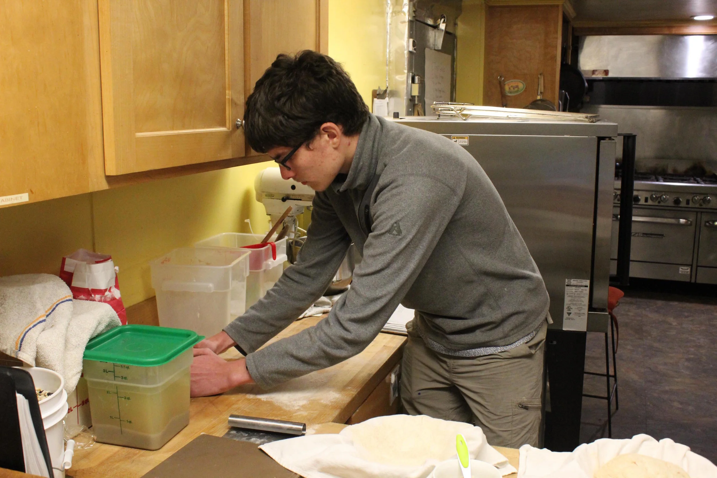 Dan shaping loaves of sourdough made from scratch