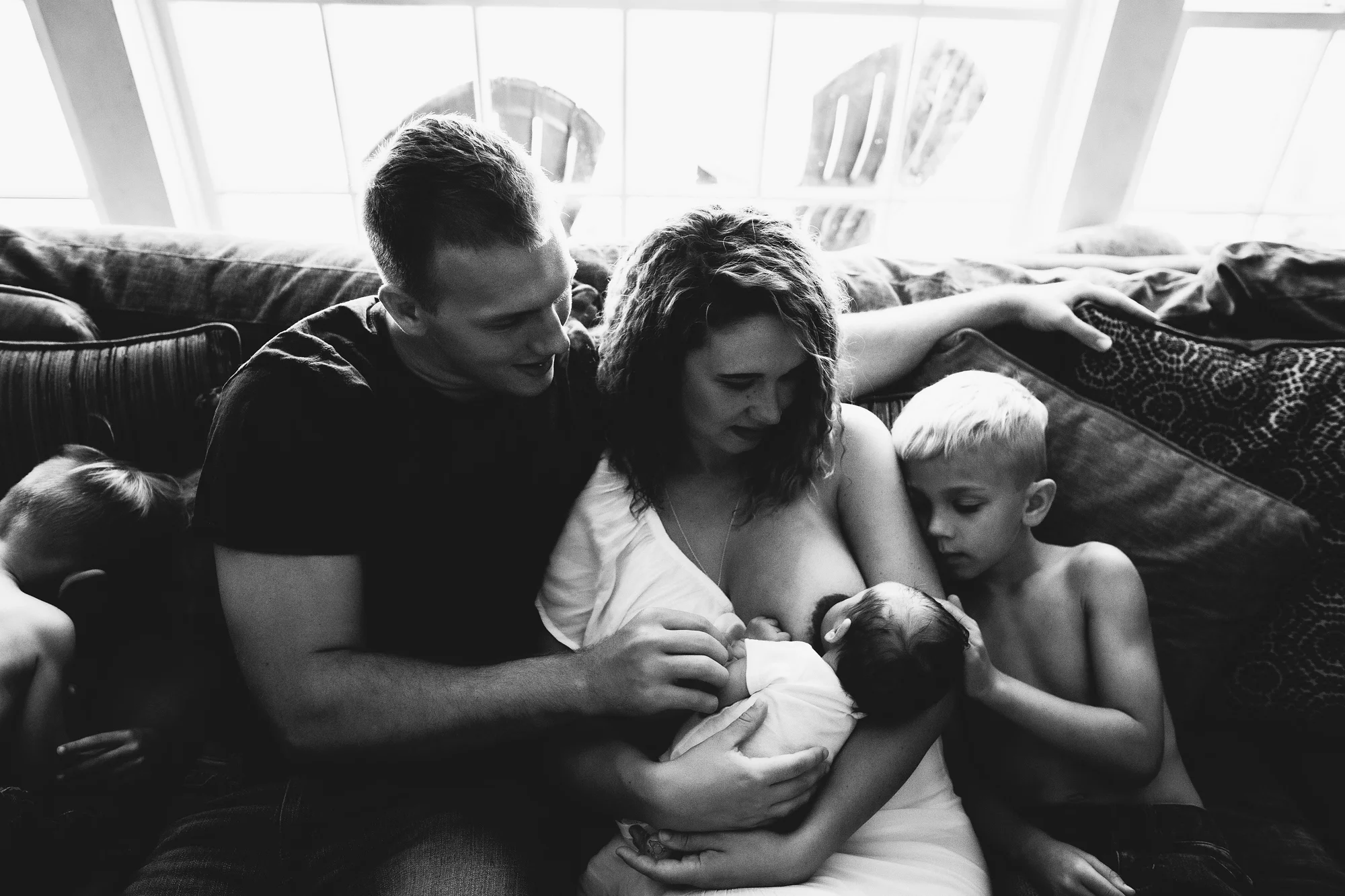 newborn photos with mom and dad, in home newborn photographer st pete fl