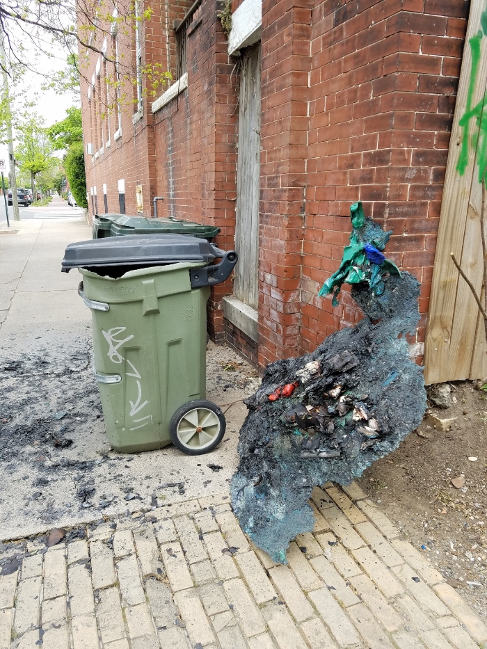 The aftermath of a recycle bin fire. I didn't start the fire.