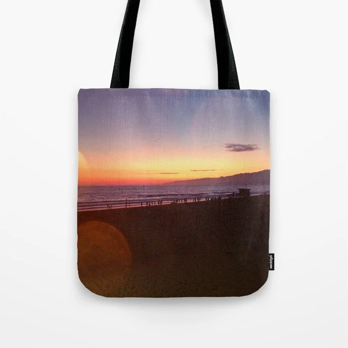 summer-sunset-on-the-beach2478895-bags.jpg