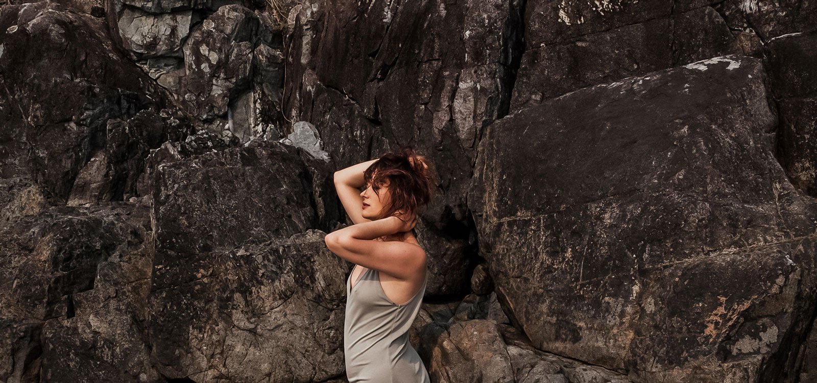 woman-posing-in-front-of-cliff.jpg