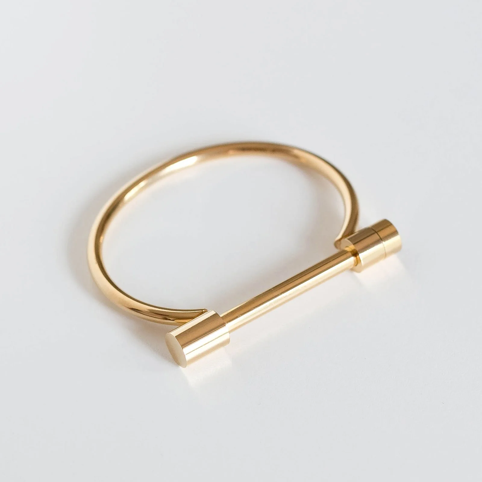 product-photography-coquitlam-gold-bracelet-flat-lay-white-background.jpg