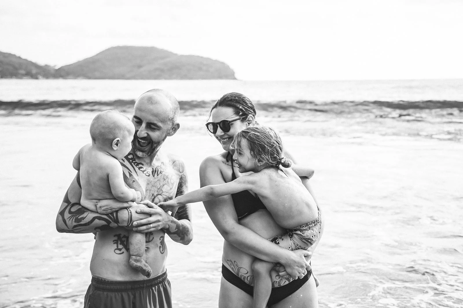 black-and-white-family-photography-family-on-beach-travel-lifestyle.jpg