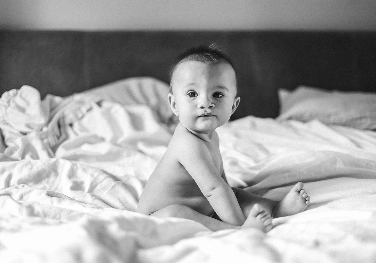 coquitlam-bc-child-portrait-photography-baby-on-bed.jpg