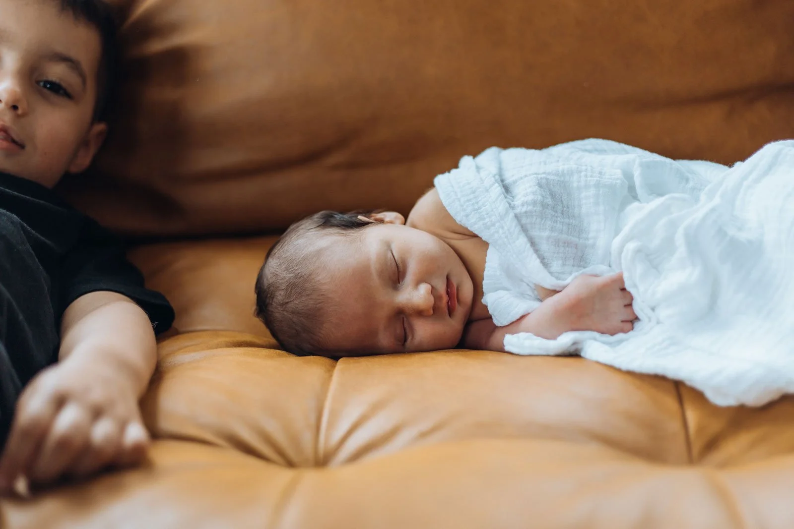 coquitlam-bc-in-home-newborn-lifestyle-photography-baby-on-couch.jpg
