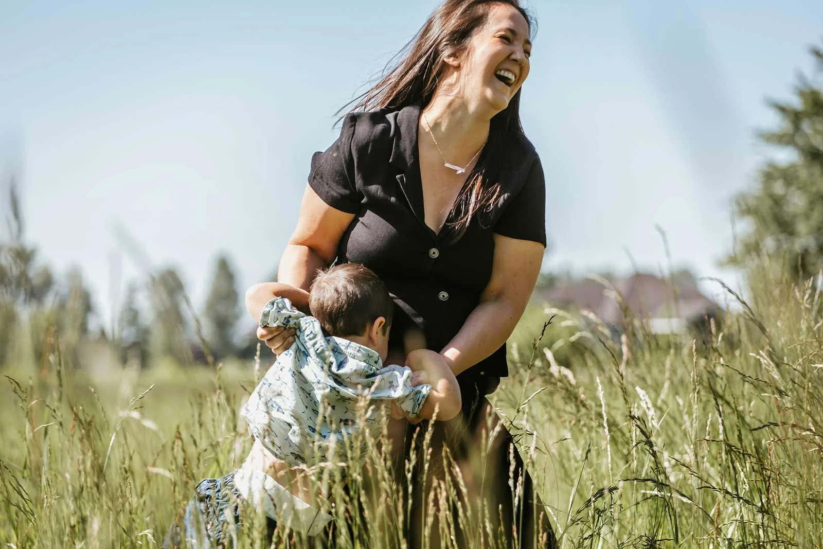 coquitlam-bc-maternity-family-photography-mom-and-son-in-grass.jpg