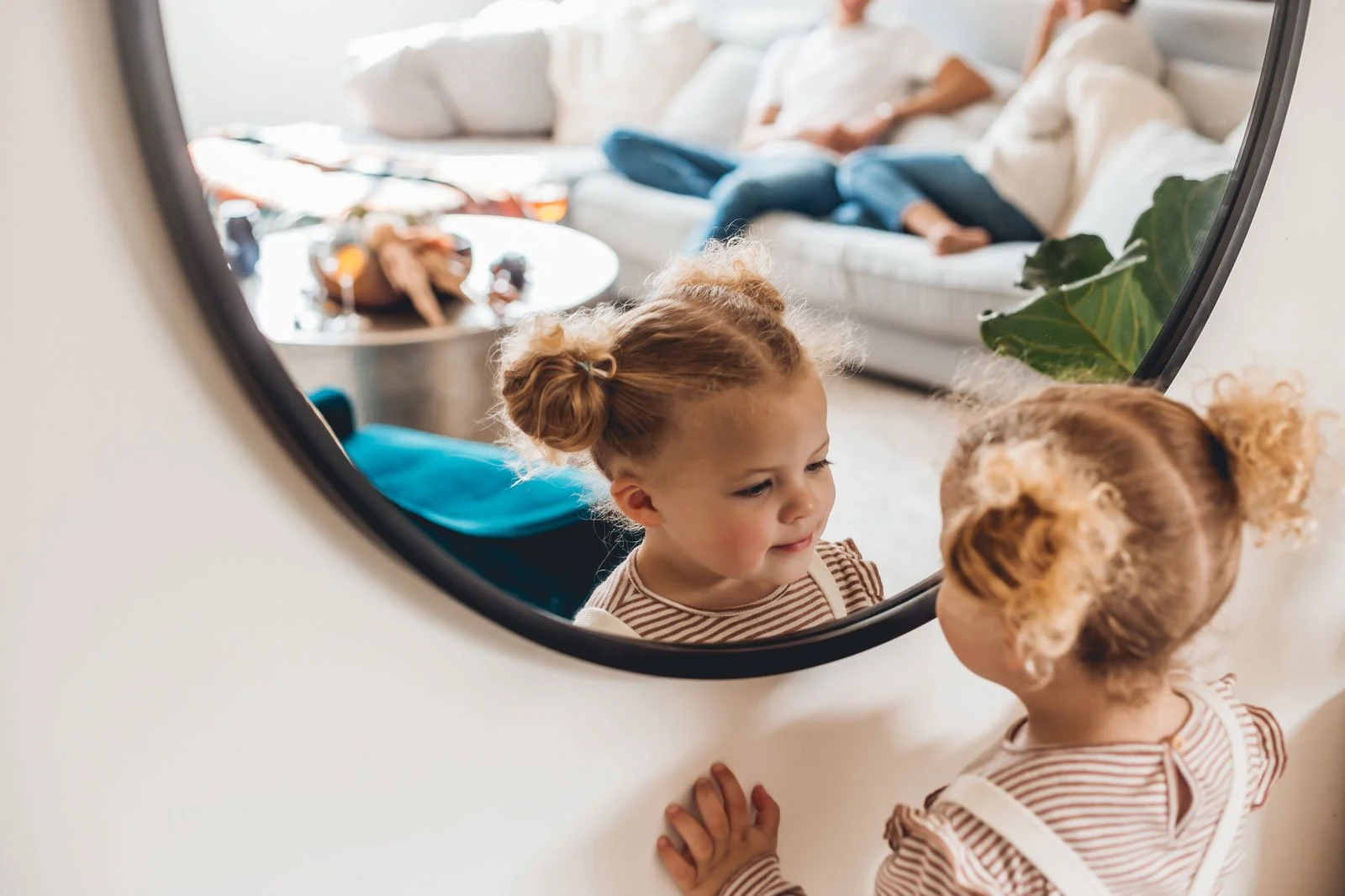 port-coquitlam-bc-family-photography-toddler-at-mirror-candid.jpg