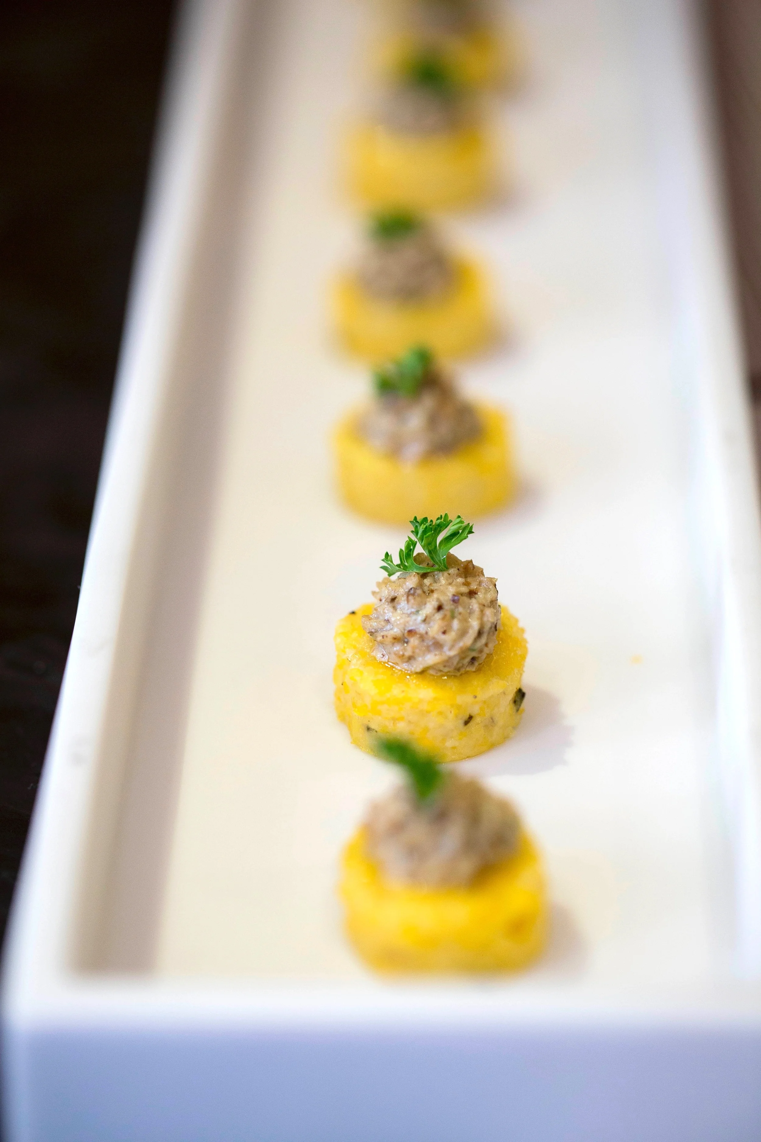Parmesan Polenta Rounds with a truffled wild mushroom melange