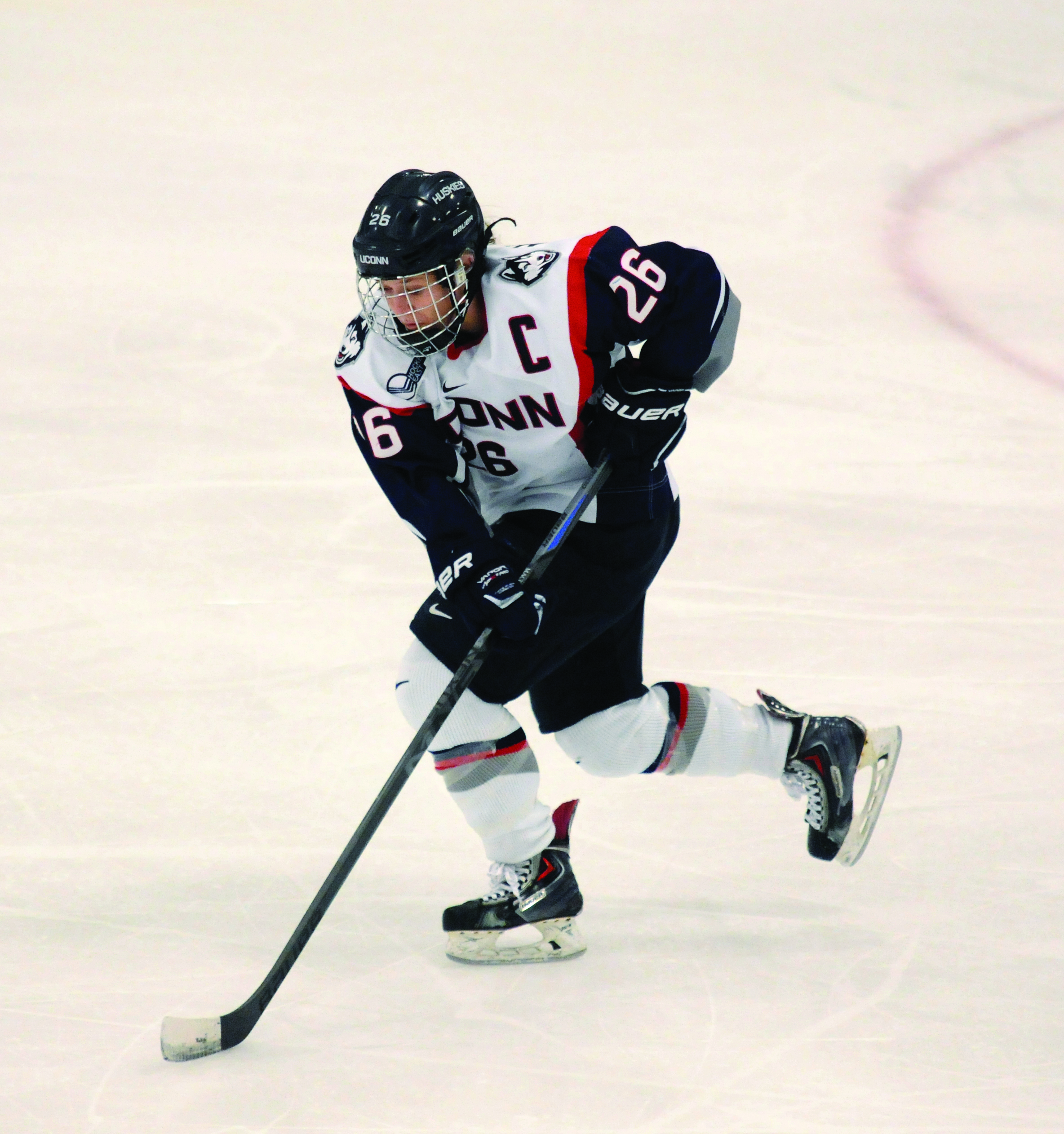 UConn senior captain Sarah MacDonnell skates in a game against the University of New Hampshire on Feb. 28, 2015. She is finishing up what has been a stellar career at UConn. (Santiago Pelaez/The Daily Campus)