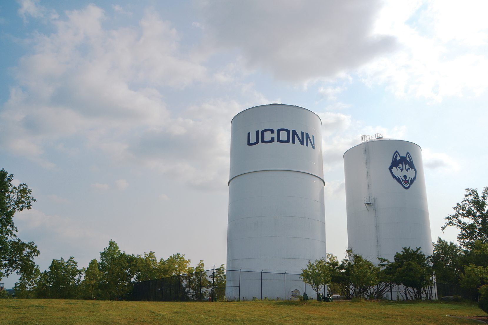 In this photo, the UConn water towers are pictured on the North side of campus, between the Towers Residence Hall complex and Husky Village. A water conservation alert has been in effect throughout the first week of classes. (Bailey Wright/The Daily Campus)