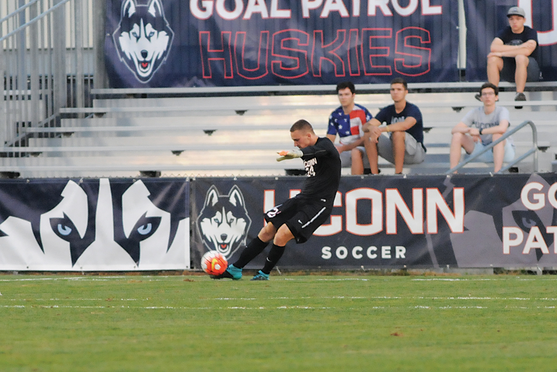 UConn men's soccer goalie Scott Levene kicks the ball downfield during the Huskies' game against Dartmouth on Friday, Sept. 4, 2015. While the Huskies have yet to score a goal this season, Levene has led the backline to three consecutive shutouts to open the 2015 campaign. (Amar Batra/The Daily Campus)
