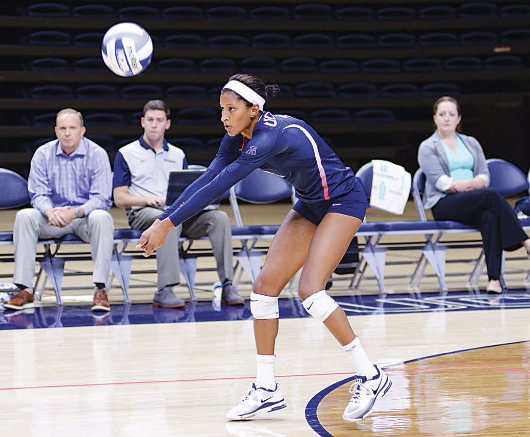 UConn junior outside hitter Jade Strawberry returns the ball during the Dog Pound Challenge last weekend. Strawberry led the way for UConn in game one against Bryant University, recording a double-double consisting of a career-high 15 kills and 14 digs. (Jason Jiang/The Daily Campus)