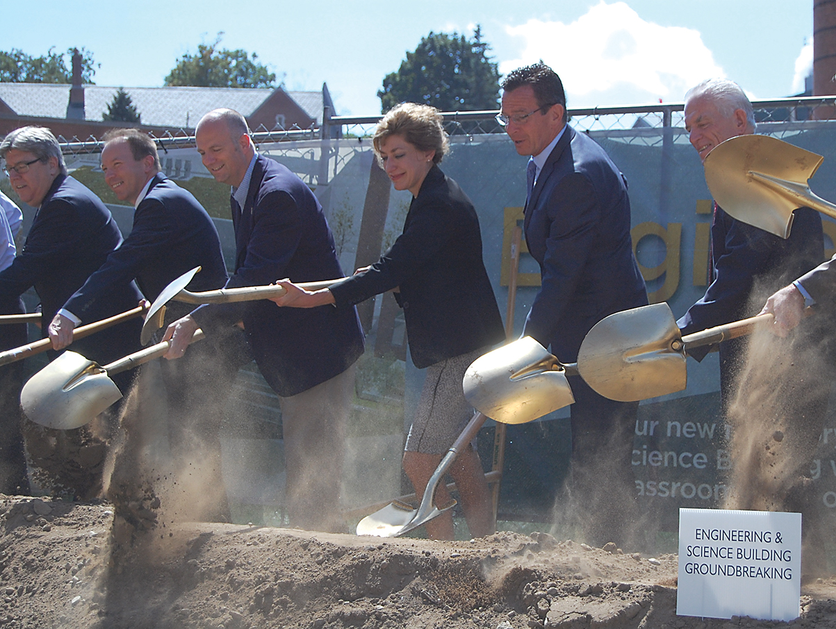 (Middle, L-to-R) State Rep. Gregg Haddad (D-Mansfield), UConn president Susan Herbst, Connecticut Gov. Dannel P. Malloy and other officials break ground on the university's new engineering building in Storrs on Wednesday, Sept. 9, 2015. (Ashley Maher/The Daily Campus)