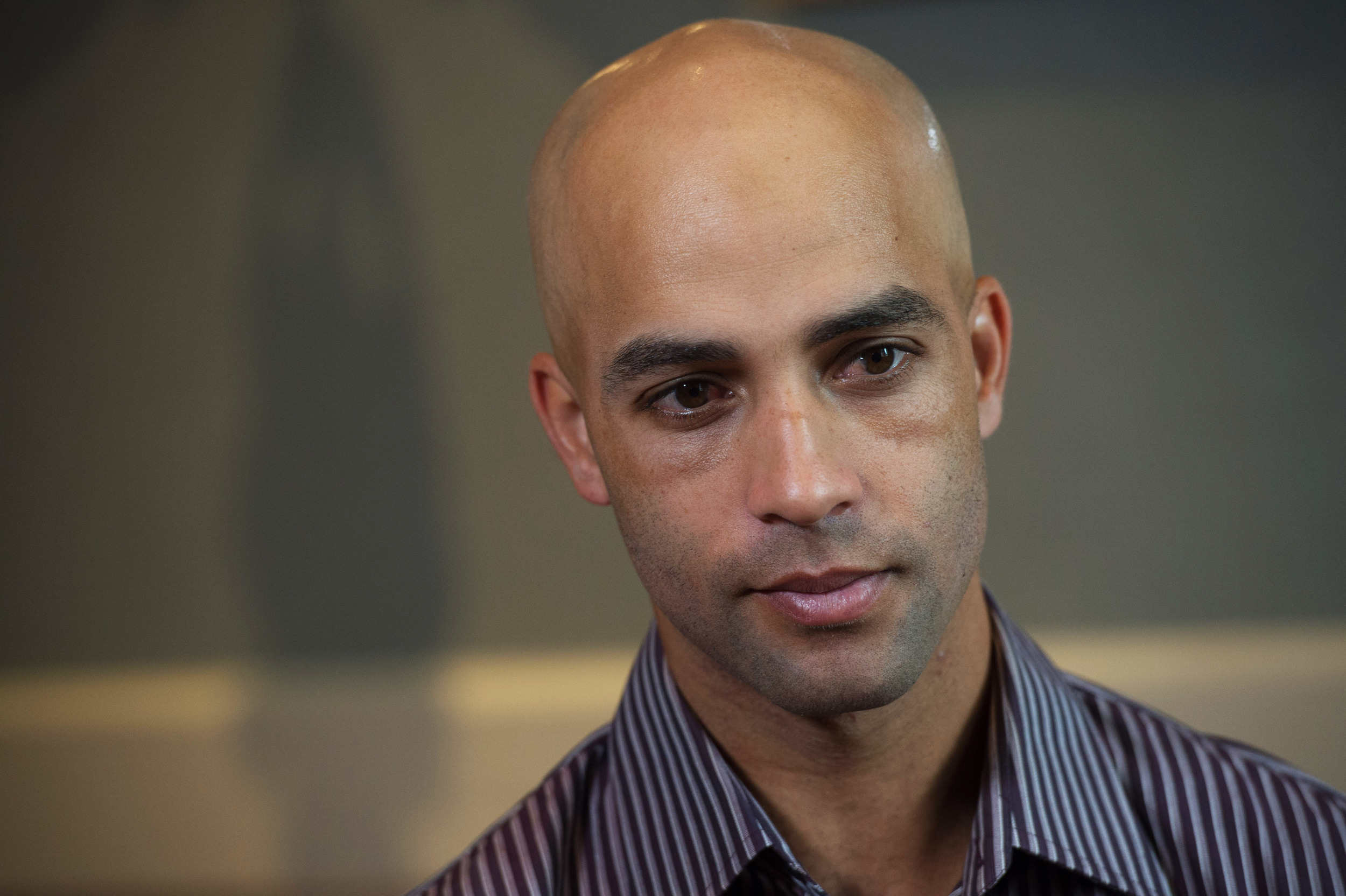 Former tennis star James Blake discusses his mistaken arrest by the New York City Police Department during an interview, Saturday, Sept. 12, 2015, in New York. Video surveillance released Friday of the mistaken arrest shows a plainclothes police officer who has a history of excessive-force complaints grabbing Blake by the arm and tackling him to the ground. (Bryan R. Smith/AP)