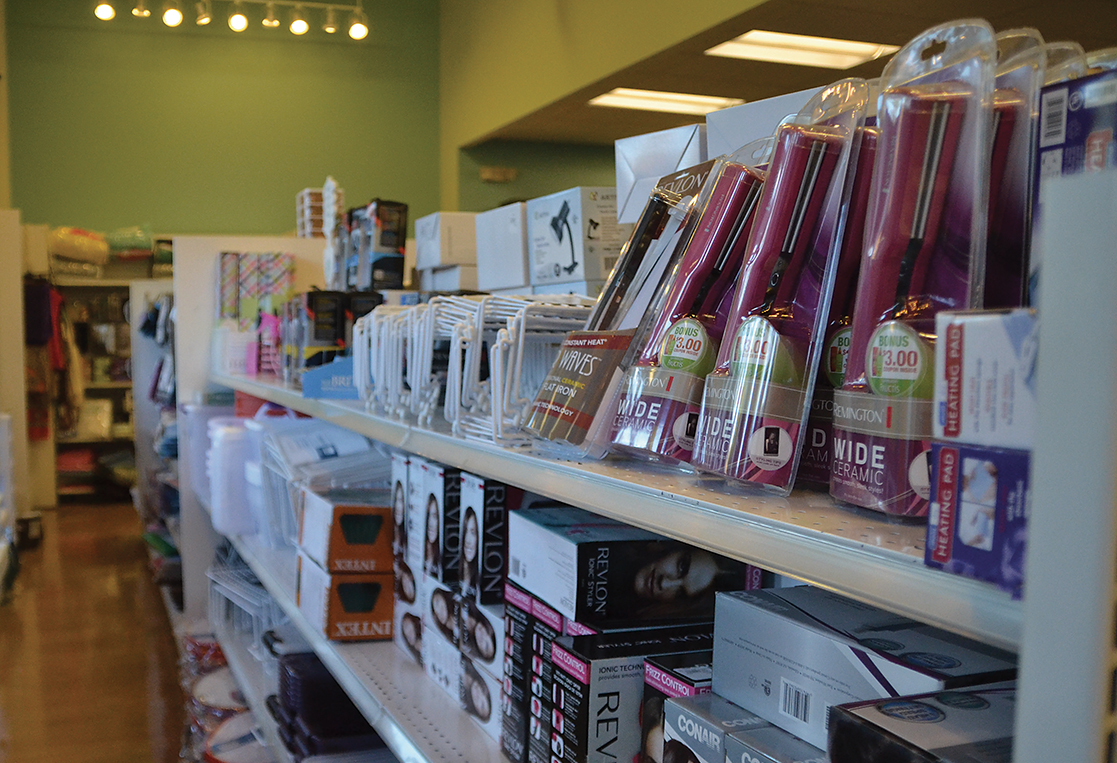 In this photo, a shelf containing hair products and other dorm-related items is pictured in the UConn Co-op in Storrs, Connecticut. The Co-op had 20,276 customers during move-in weekend, Aug. 28 through Aug. 31. (Amar Batra/The Daily Campus)