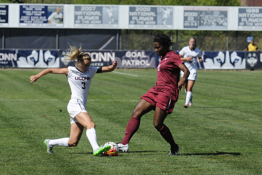 UConn junior forward Rachel Hill fights for the ball during the Huskies' game against Temple at Joseph J. Morrone Stadium on Friday, Oct. 2, 2015. (Amar Batra/The Daily Campus)