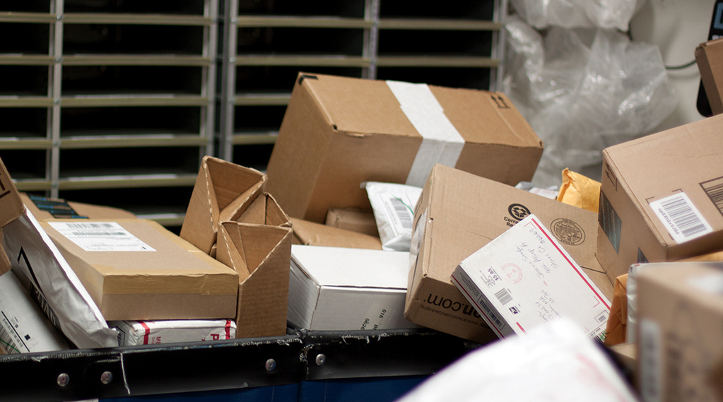 University officials say they are working towards a solution to sorting the packages that have been piling up in mailrooms across campus since the beginning of the school year. (Mei Buzzell /The Daily Campus ).