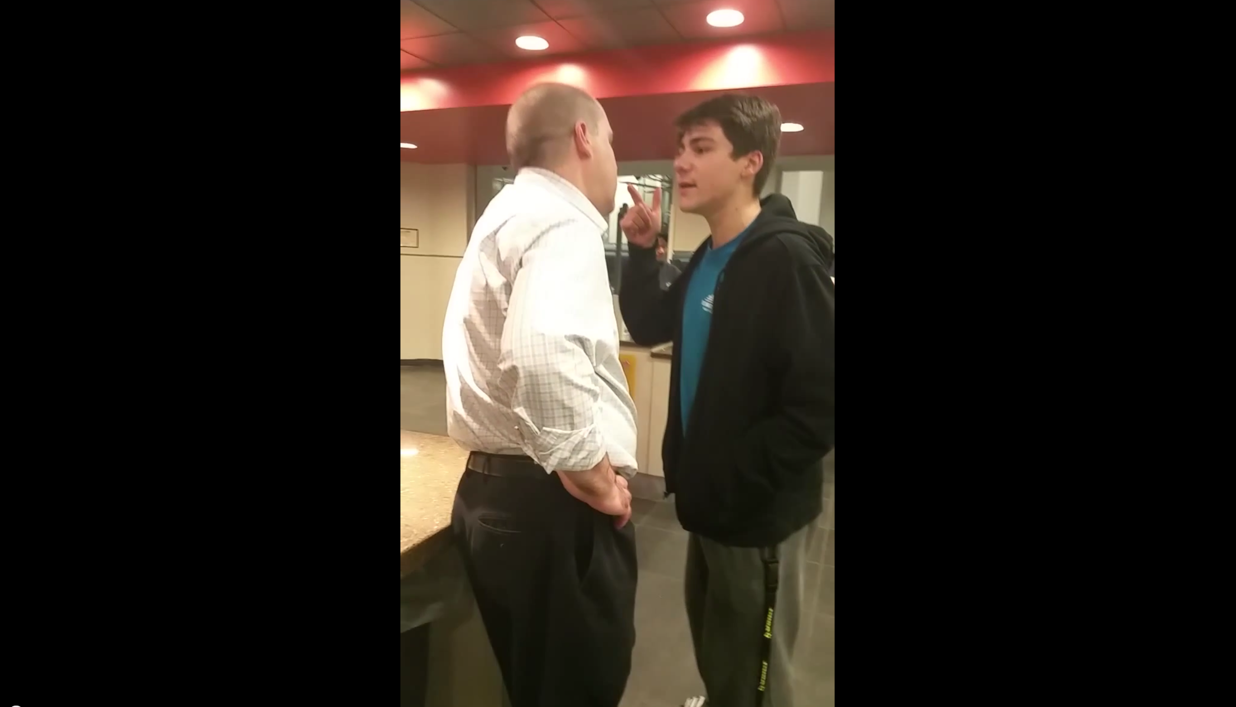 In this screenshot, UConn student Luke Gatti is seen arguing with a Student Union manager after being denied service at the Union Street Market. (Screenshot/YouTube)