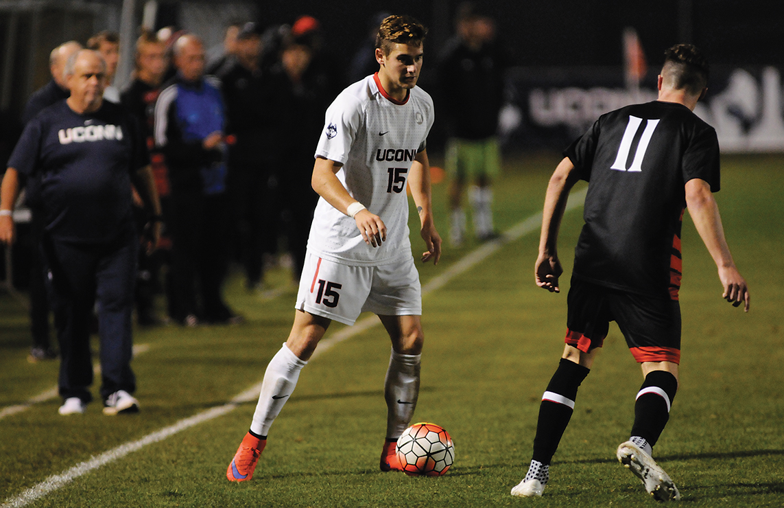 UConn men's soccer junior defender Jacob Nerwinski dribbles the ball during the Huskies' game against Cincinnati at Joseph J. Morrone Stadium in Storrs, Connecticut on Wednesday, Oct. 7, 2015. (Jackson Haigis/The Daily Campus)