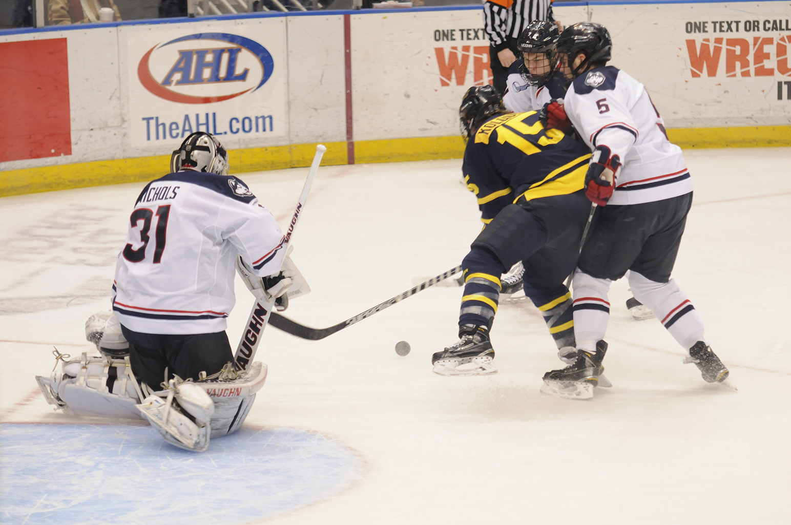 In this file photo, UConn goaltender Rob Nichols (31) goes down to make a save during the Huskies' game against Merrimack at XL Center in Hartford, Connecticut on Tuesday, Feb. 10, 2015. (File Photo/The Daily Campus)