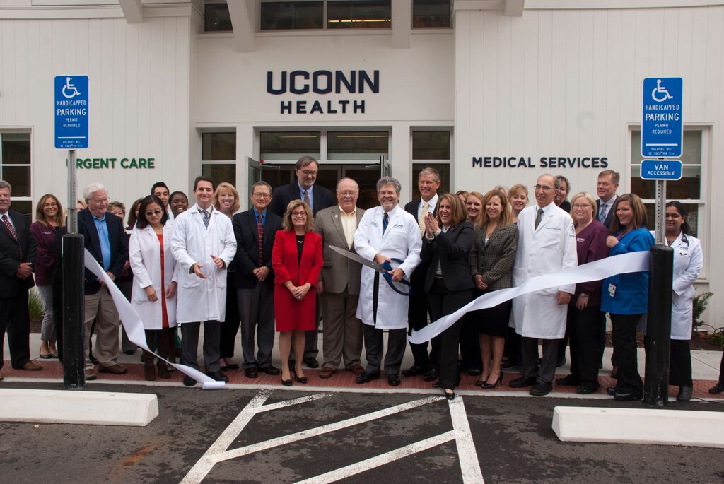 In this photo, the ribbon cutting ceremony is seen at the new UConn Health urgent care and medical office in Canton, Connecticut on Monday, Oct. 12, 2015. (Courtesy)