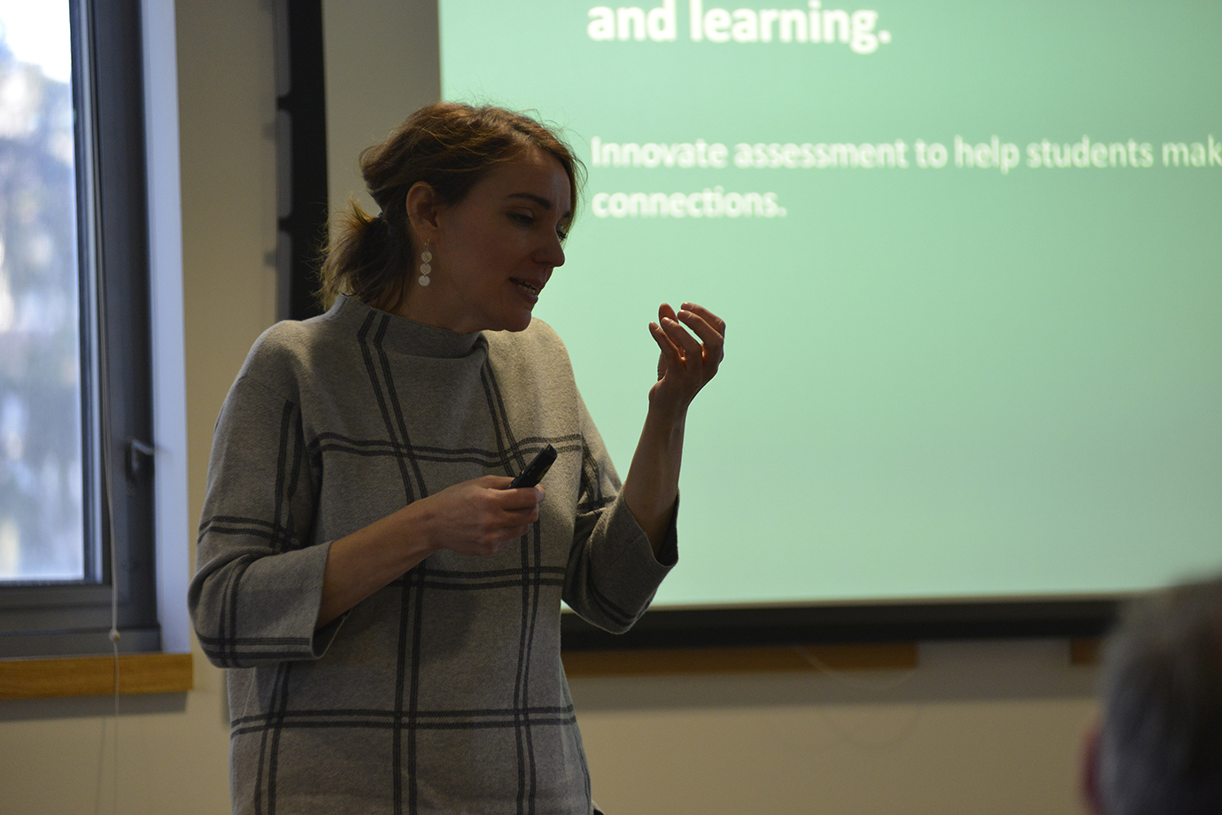 Professor Mya Poe of Northeaster University presents her research on assessing students' writing in the Philip E. Austin building on Monday, Oct. 19, 2015. (Jason Jiang/The Daily Campus)