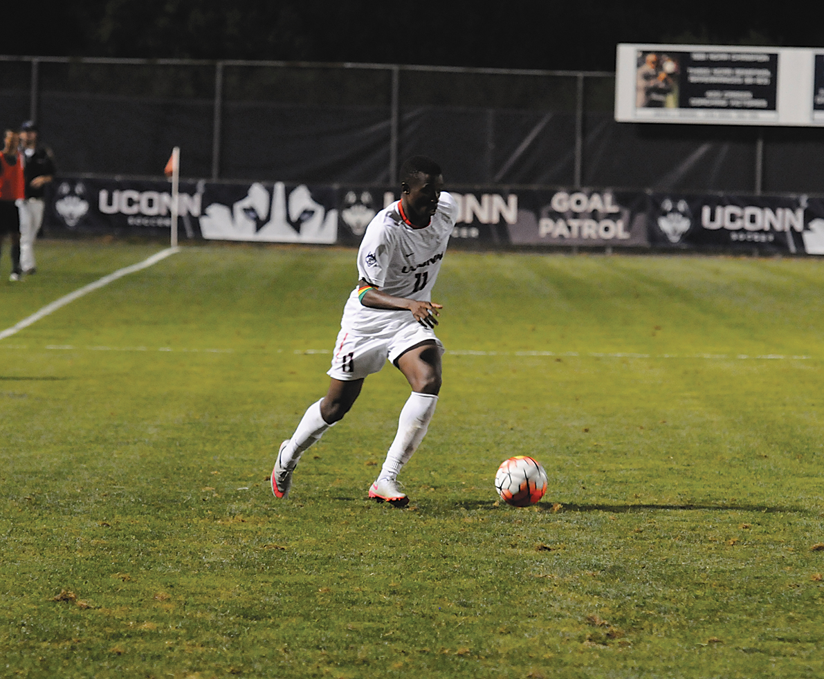 UConn freshman forward Abdou Mbacke Thiam dribbles the ball during the Huskies' game against Dartmouth on Friday, Sept. 4, 2015. Thiam scored a pair of second-half goals to lift UConn to a 2-0 victory on the road Wednesday against Temple. (Amar Batra/The Daily Campus)