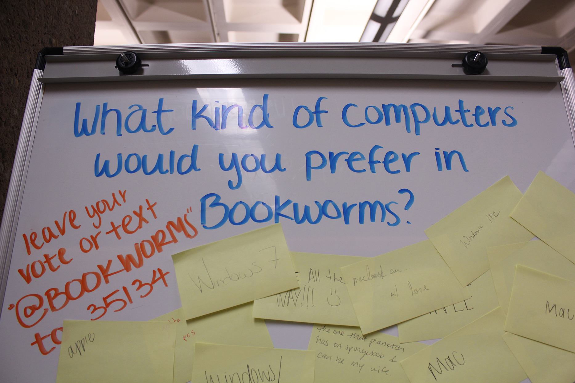 In this photo, a whiteboard is pictured on the second floor of the Homer D. Babbidge Library asking students for feedback on what kind of computers they would prefer in the Bookworms section of the library. (Marissa DiBella/The Daily Campus)
