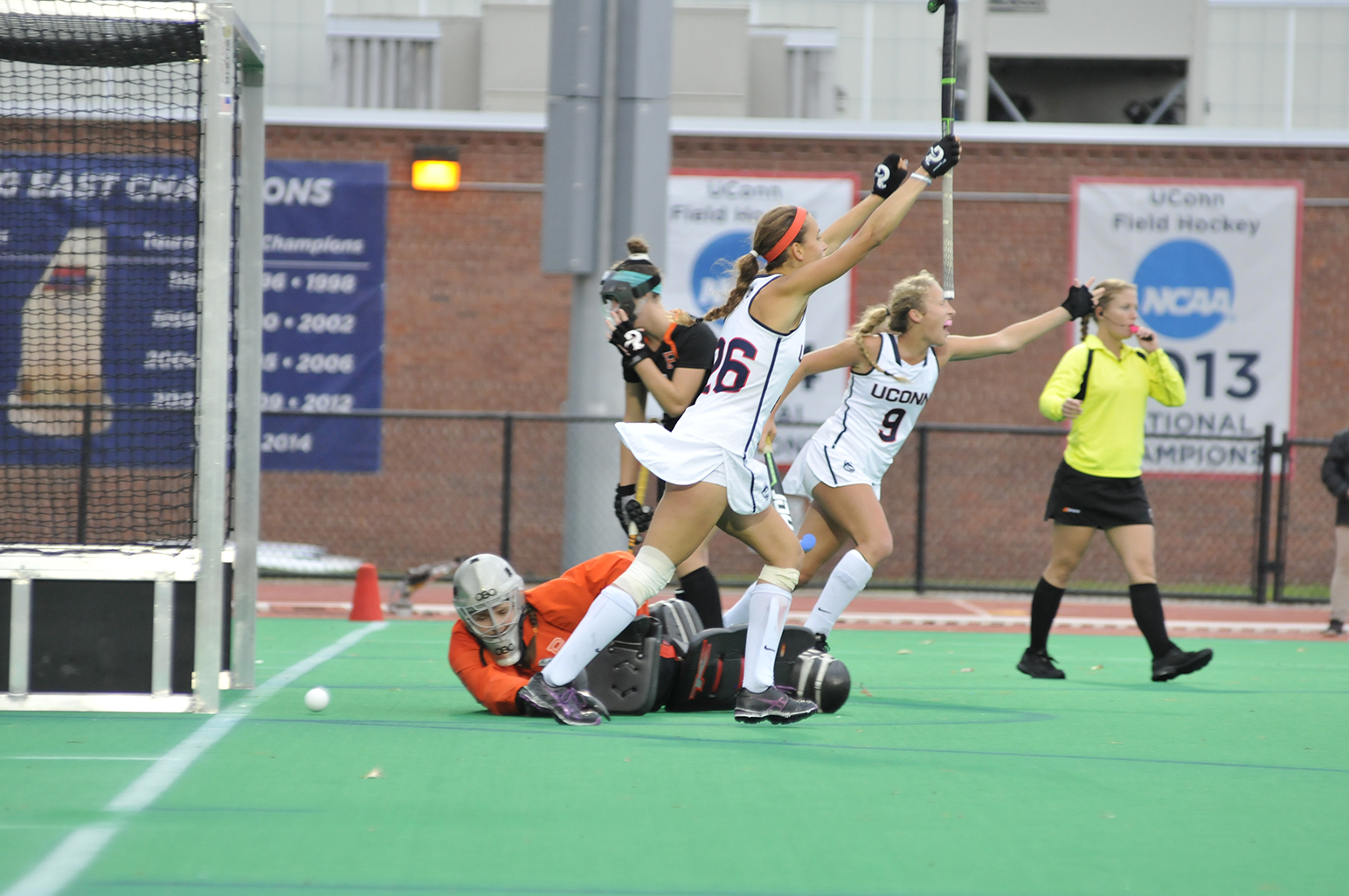 Charlotte Veitner (26) and Amelia Iacobucci (9) celebrate a goal during UConn's 4-1 victory over Princeton on Sunday, Oct. 25, 2015. The Huskies improved to 17-0 on the season with the victory. (Jason Jiang/The Daily Campus)