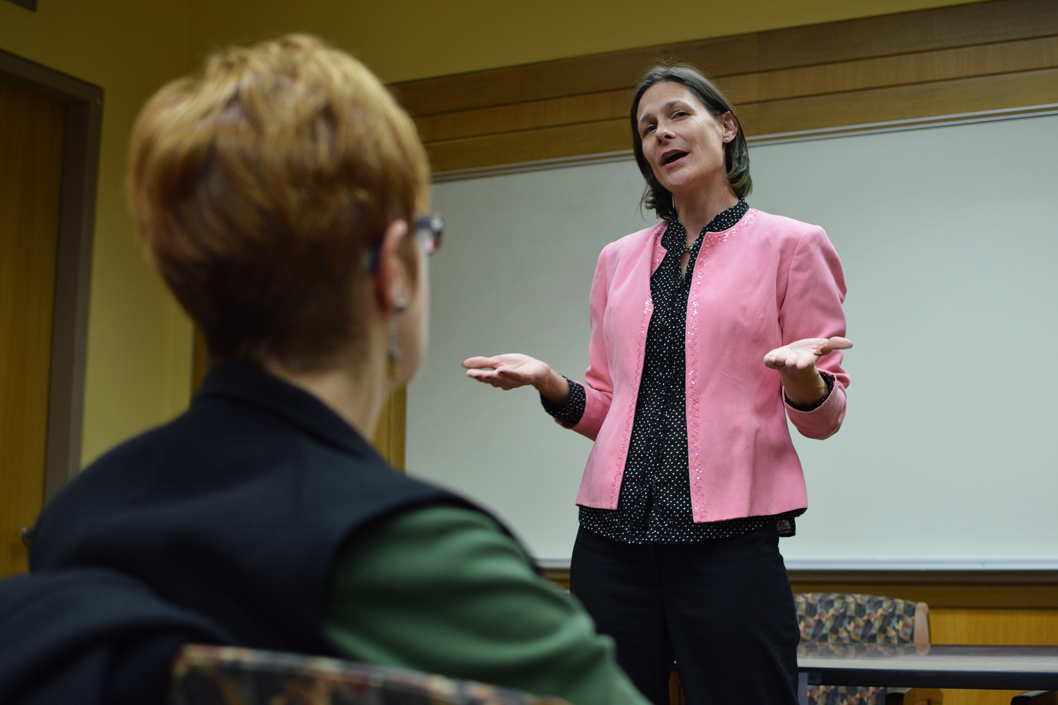 Barbara Gurr, assistant professor in residence in the Women, Gender and Sexuality Studies department, speaks during “WGSS, Feminism and the Future: Celebrating New Scholarship” at Homer Babbidge Library in Storrs, Connecticut on Monday, Oct. 26, 2015. (Grant Zitomer/The Daily Campus)