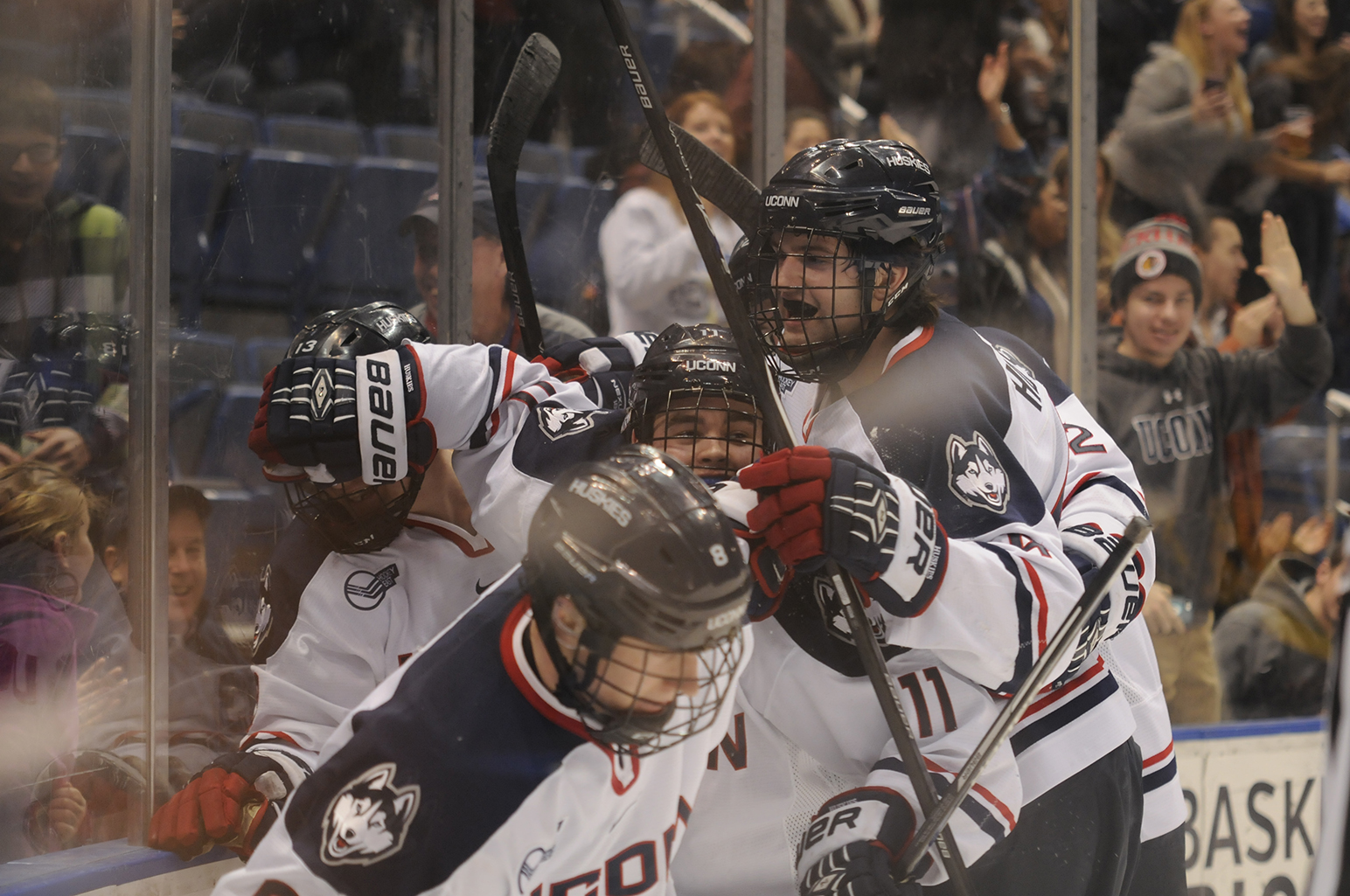 In this photo, members of the UConn men's ice hockey team are seen celebrating after a late goal that earned them a 1-0 victory over Merrimack at the XL Center in Hartford, Connecticut on Feb. 10, 2015. (File Photo/The Daily Campus)