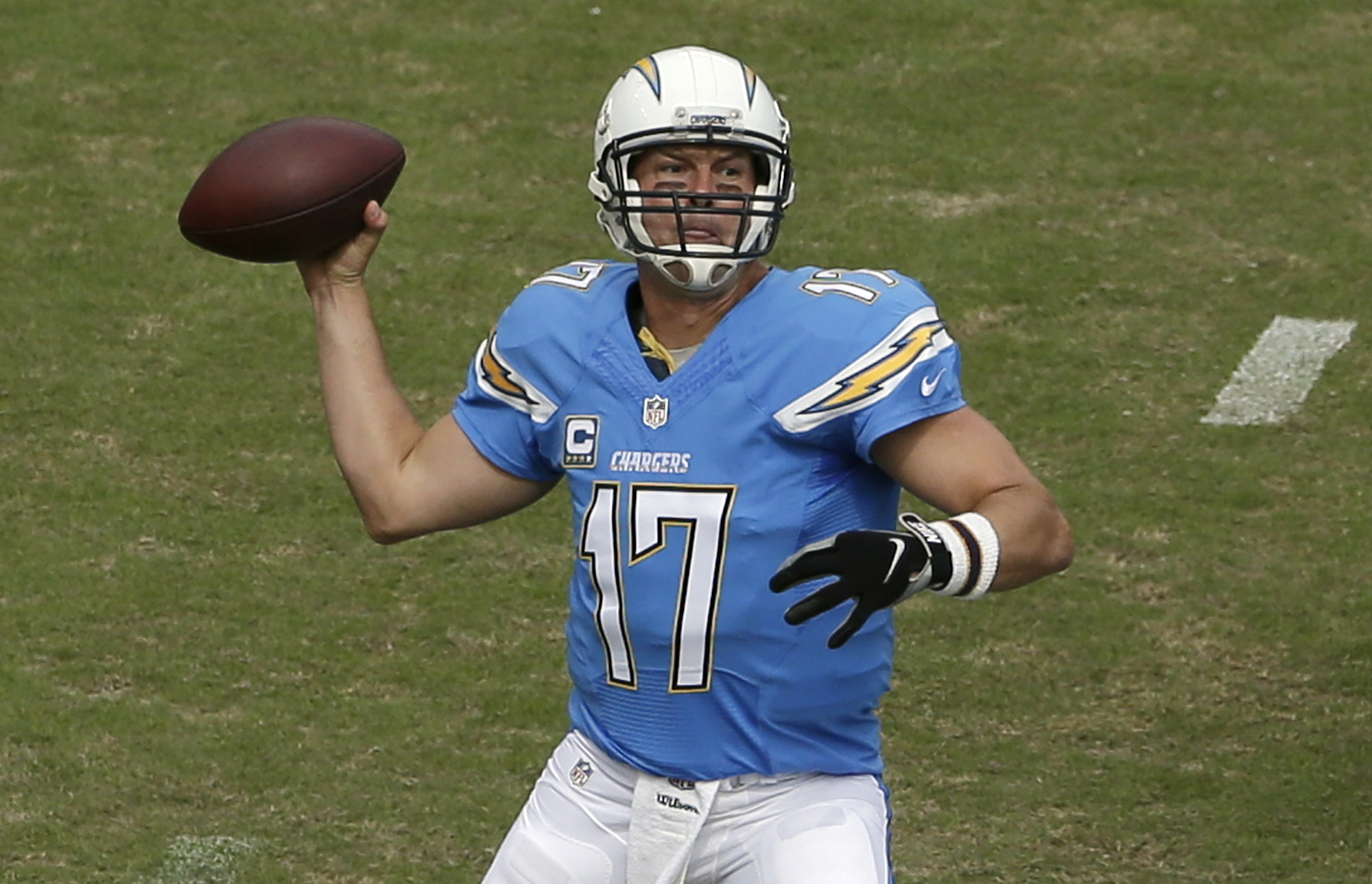 San Diego Chargers quarterback Philip Rivers prepares to throw a pass against the Oakland Raiders during the first half of an NFL football game Sunday, Oct. 25, 2015, in San Diego. (AP)