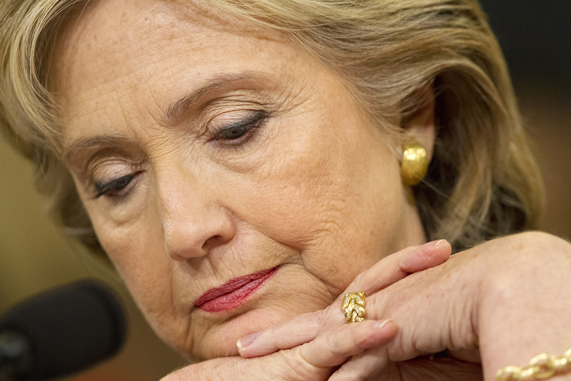 Democratic presidential candidate and former Secretary of State Hillary Rodham Clinton, looks down during questioning on Capitol Hill in Washington on Thurs., Oct. 22 before the House Select Committee on Benghazi. (AP)