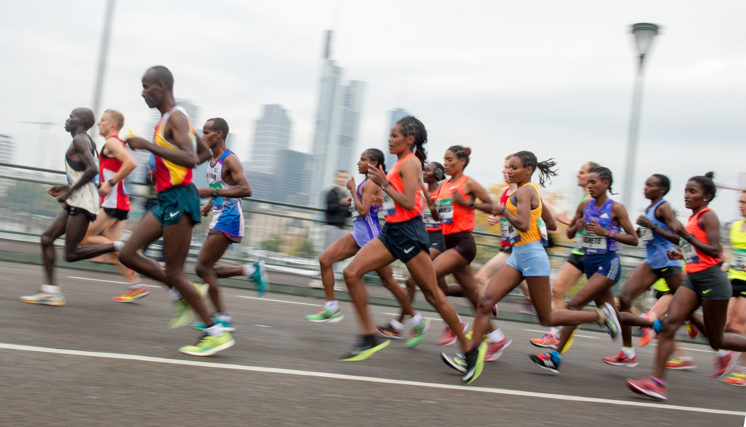 Participants run across a bridge over river Main, during the Frankfurt marathon in Frankfurt, central Germany, Sunday Oct. 25, 2015. (AP)