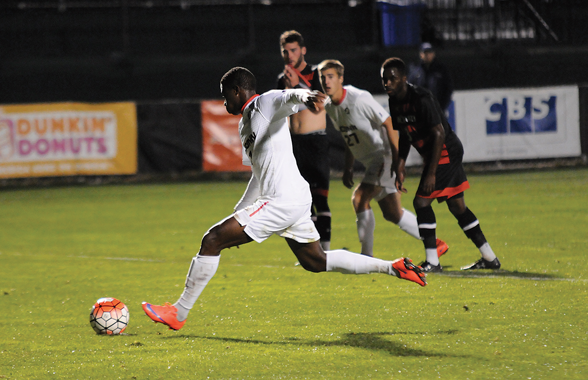 UConn men's soccer freshman forward Abdou Mbacke Thiam takes a penalty during the Huskies' game against Cincinnati at Joseph J. Morrone Stadium in Storrs, Connecticut on Wednesday, Oct. 7, 2015. Thiam scored UConn's lone goal in the 1-1 draw. (Jackson Haigis/The Daily Campus)