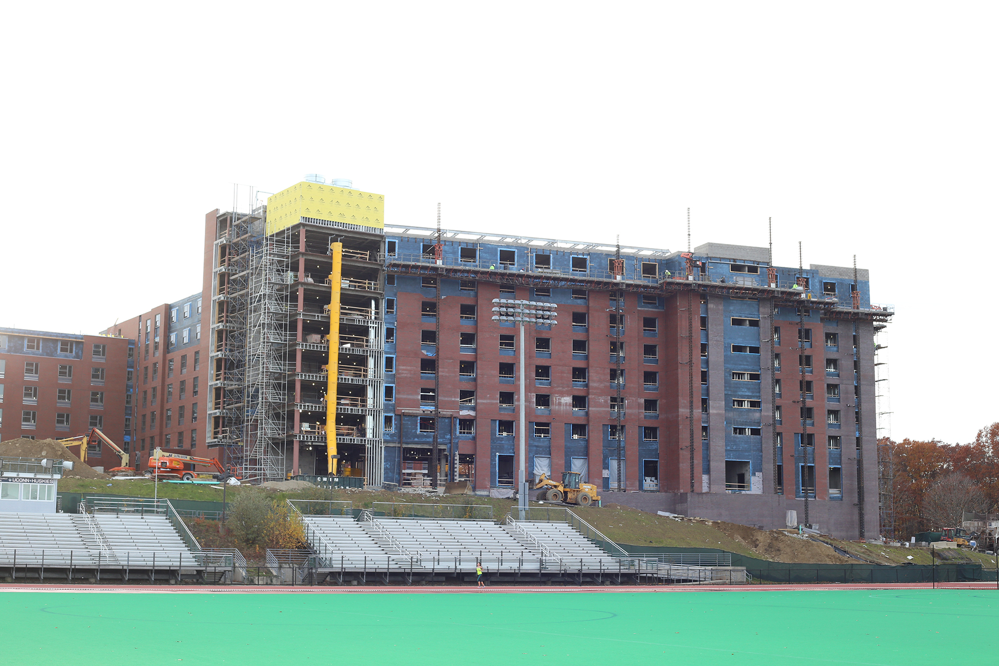 In this photo, the new STEM dorm is seen under construction behind the Sherman Family Sports Complex in Storrs, Connecticut on Monday, Nov. 2, 2015. (Jackson Haigis/The Daily Campus)