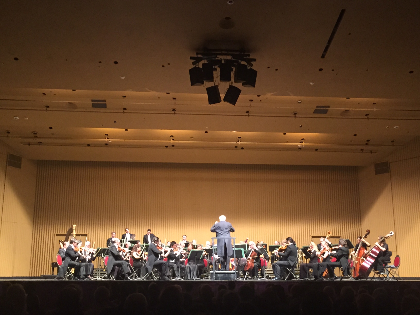 Hailing from Germany and dressed in all black, the Munich Symphony Orchestra, led by French conductor and pianist Philippe Entremont, delivered a resoundingly efficient and astounding performance Monday night at a moderately-packed Jorgensen Center for the Performing Arts on Monday, Nov. 2, 2015. (Anokh Palakurthi/The Daily Campus)
