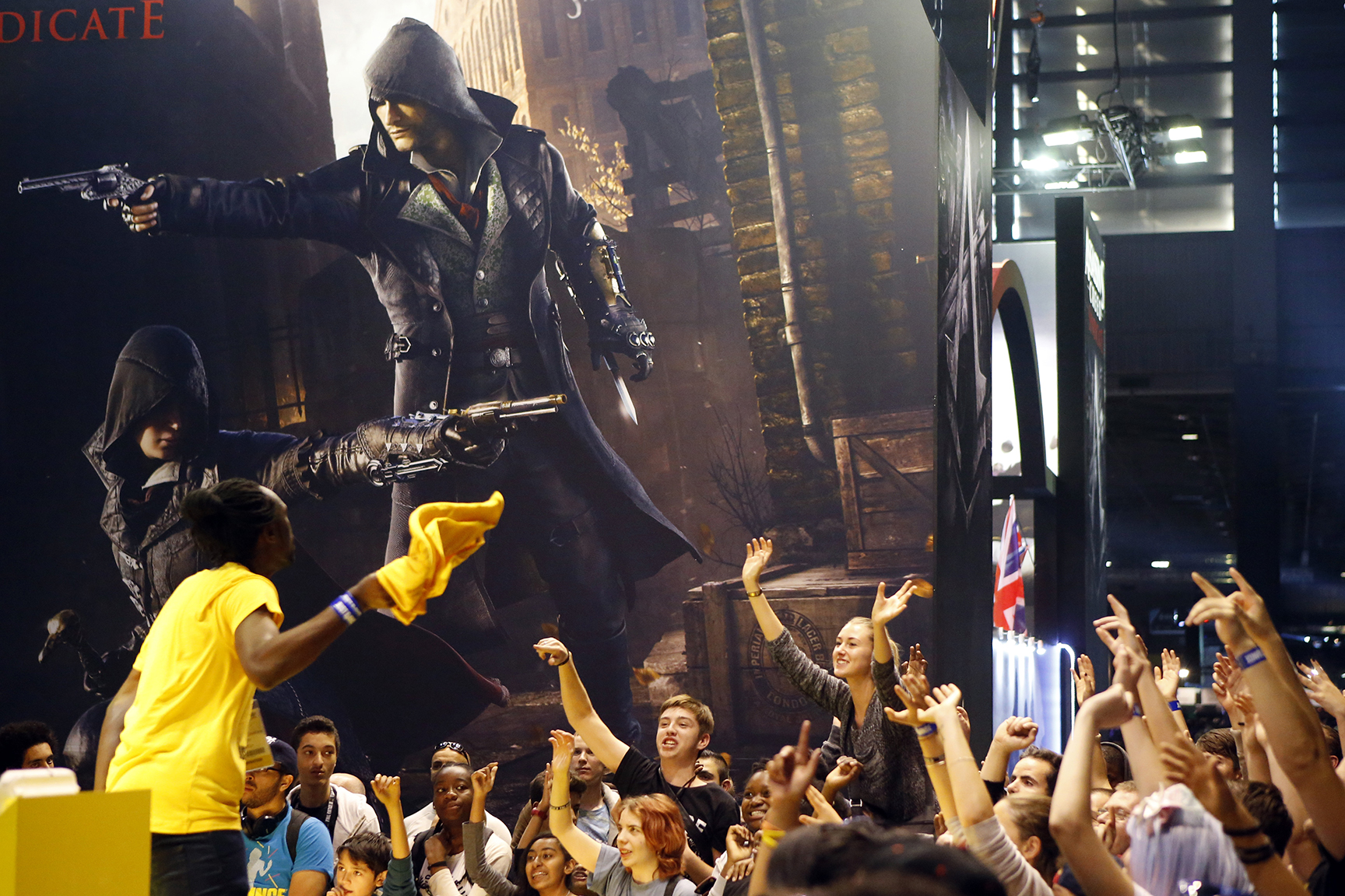 Visitors react at the Paris Games Week, a trade fair for video games in Paris, France, Sunday, Nov. 1, 2015. (AP)
