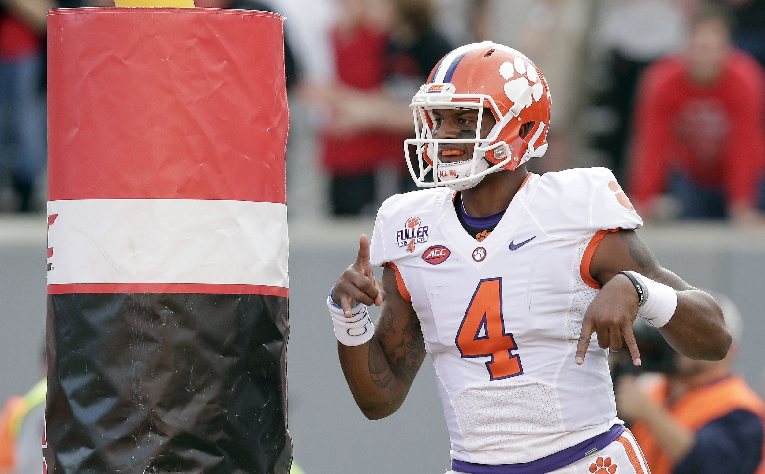 Clemson quarterback Deshaun Watson (4) reacts after his touchdown against North Carolina State during the first half of an NCAA college football game in Raleigh, N.C., Saturday, Oct. 31, 2015. The Tigers were ranked #1 in the first NCAA Playoff Rankings (AP)