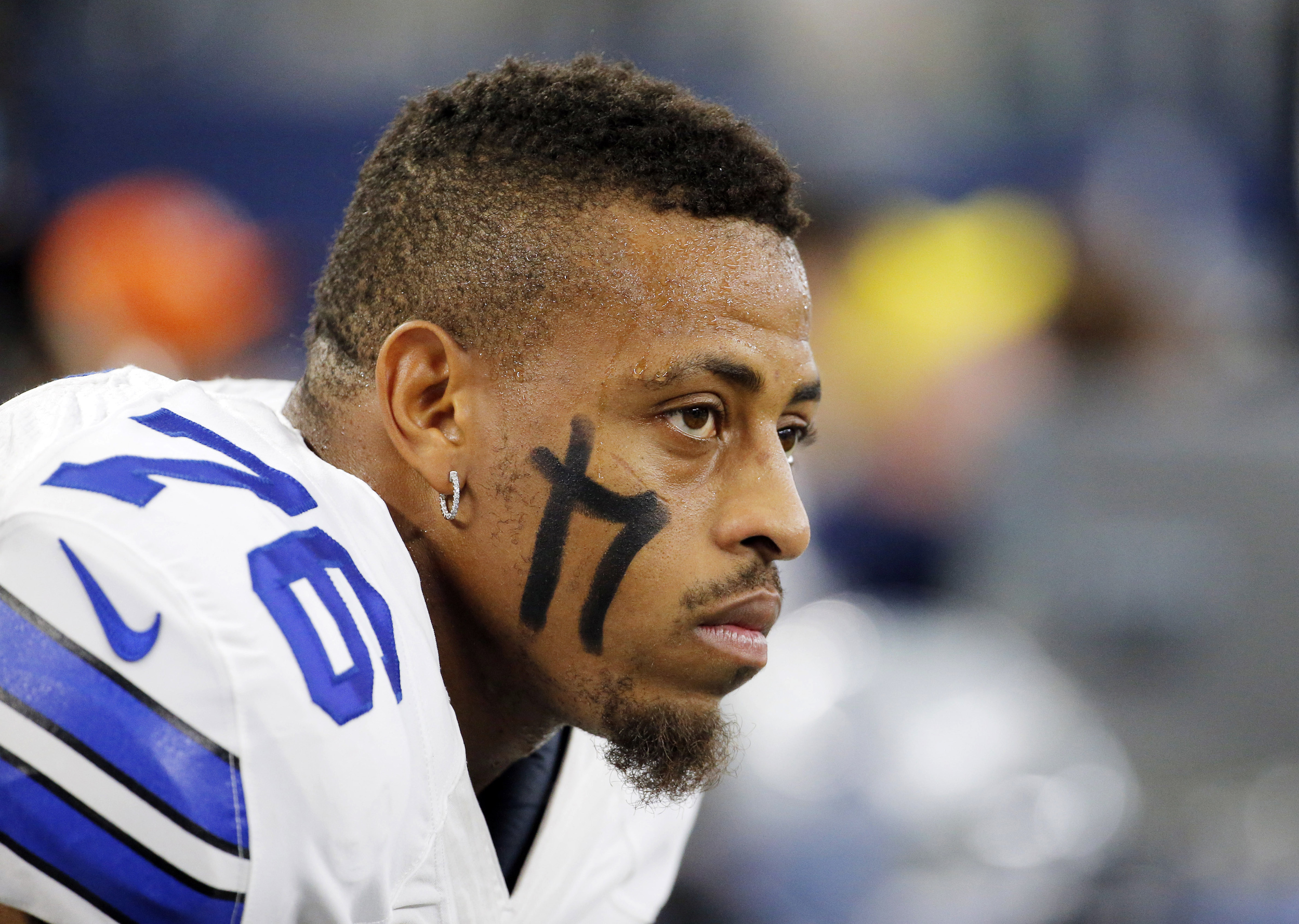 In this Sunday, Nov. 1, 2015, file photo, Dallas Cowboys defensive end Greg Hardy watches from the sideline during a game against the Seattle Seahawks in Arlington, Texas. Hardy tweeted "regret" on Saturday night, Nov. 7, after photos of his bruised ex-girlfriend from his domestic violence case were released by Deadspin a day earlier. (AP)