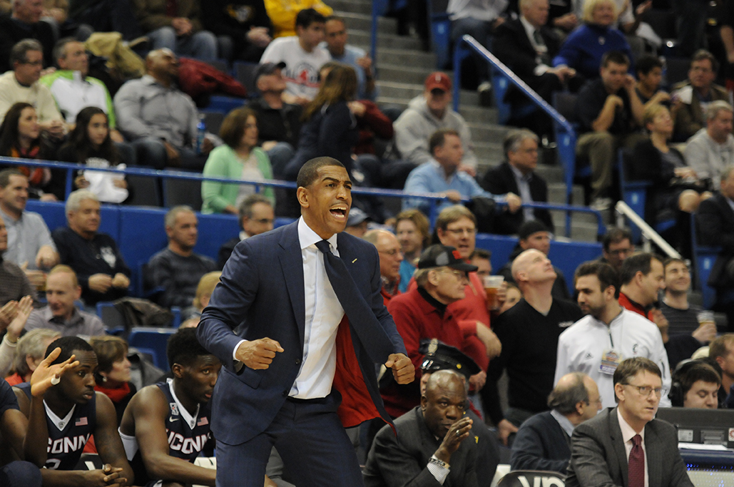 UConn men's basketball head coach Kevin Ollie is seen on the sidelines during the Huskies' game against Cincinnati during the 2015 American Athletic Conference championship at XL Center in Hartford, Connecticut on March 13, 2015. (File Photo/The Daily Campus)