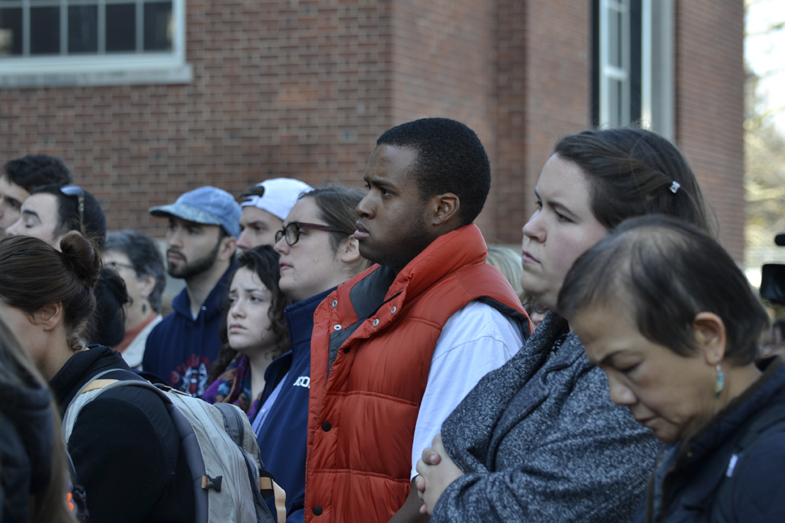 UConn students and staff look on during a demonstration against discrimination and intolerance on the back steps of the Wilbur Cross building on Monday, Nov. 16, 2015. (Rebecca Newman/The Daily Campus)