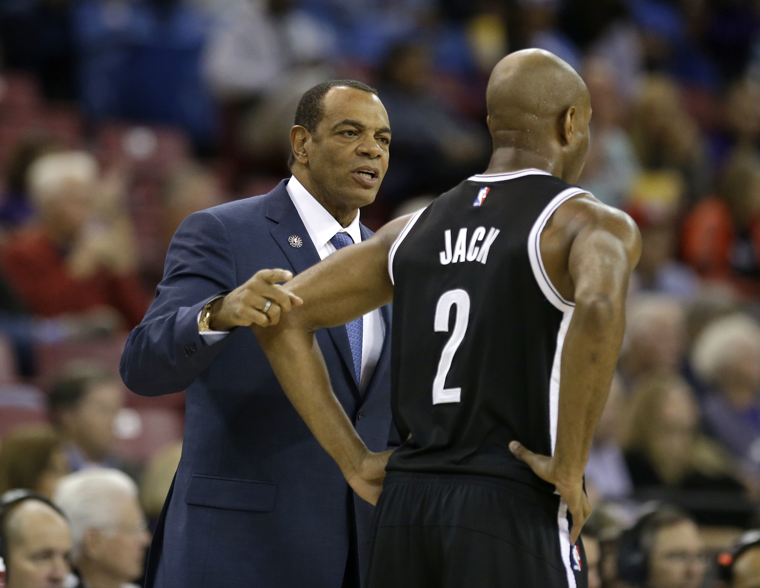 Brooklyn Nets head coach Lionel Hollins talks with guard Jarrett Jack during the first half of an NBA basketball game against the Sacramento Kings in Sacramento, Calif., Friday, Nov. 13, 2015. (Rich Pedroncelli/AP)
