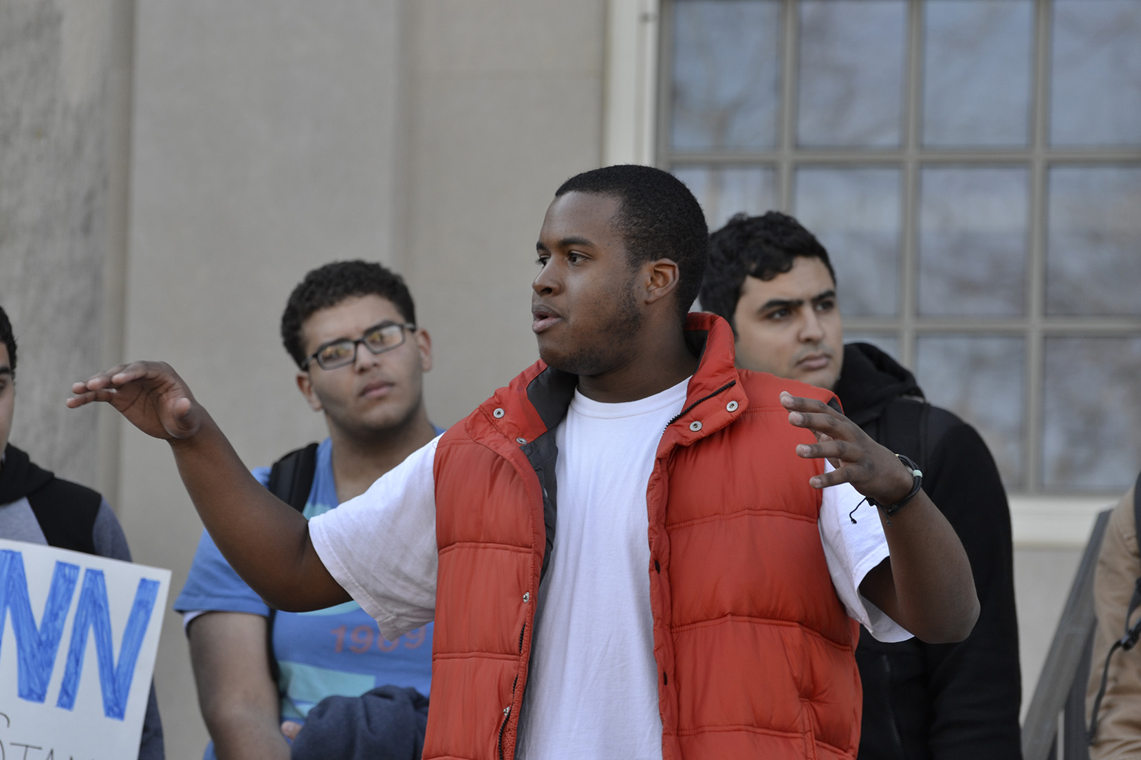 UConn senior biomedical engineering major Julian Rose addressed the crowd behind Wilbur Cross on November 16, 2015. The demonstration was held in response to the racist comments written on Mahmoud Hashem's dorm room door. (Rebecca Newman/The Daily Campus).