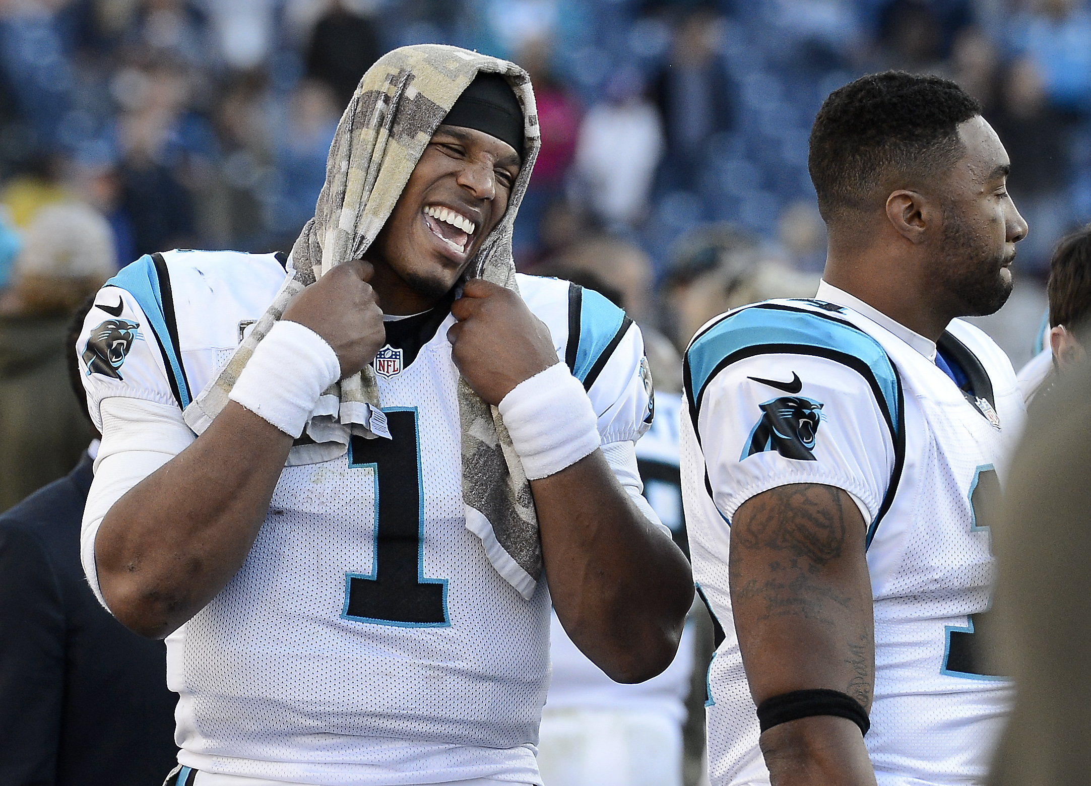 Carolina Panthers quarterback Cam Newton (1) laughs on the sideline in the closing minutes of the fourth quarter in the Panthers' 27-10 win over the Tennessee Titans in an NFL football game Sunday, Nov. 15, 2015, in Nashville, Tenn. (Mark Zaleski/AP)