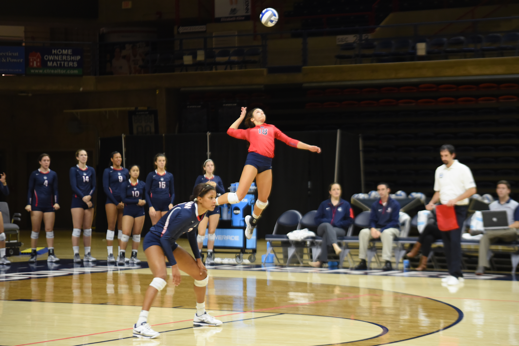 UConn defensive specialist Kennedy Arundel goes up for a serve during the a game at Gampel Pavilion in Storrs, Connecticut. The team will square off against Temple (20-8, 11-5 American) on Wednesday in what is a battle for second place in the conference. (Allen Lang/The Daily Campus)