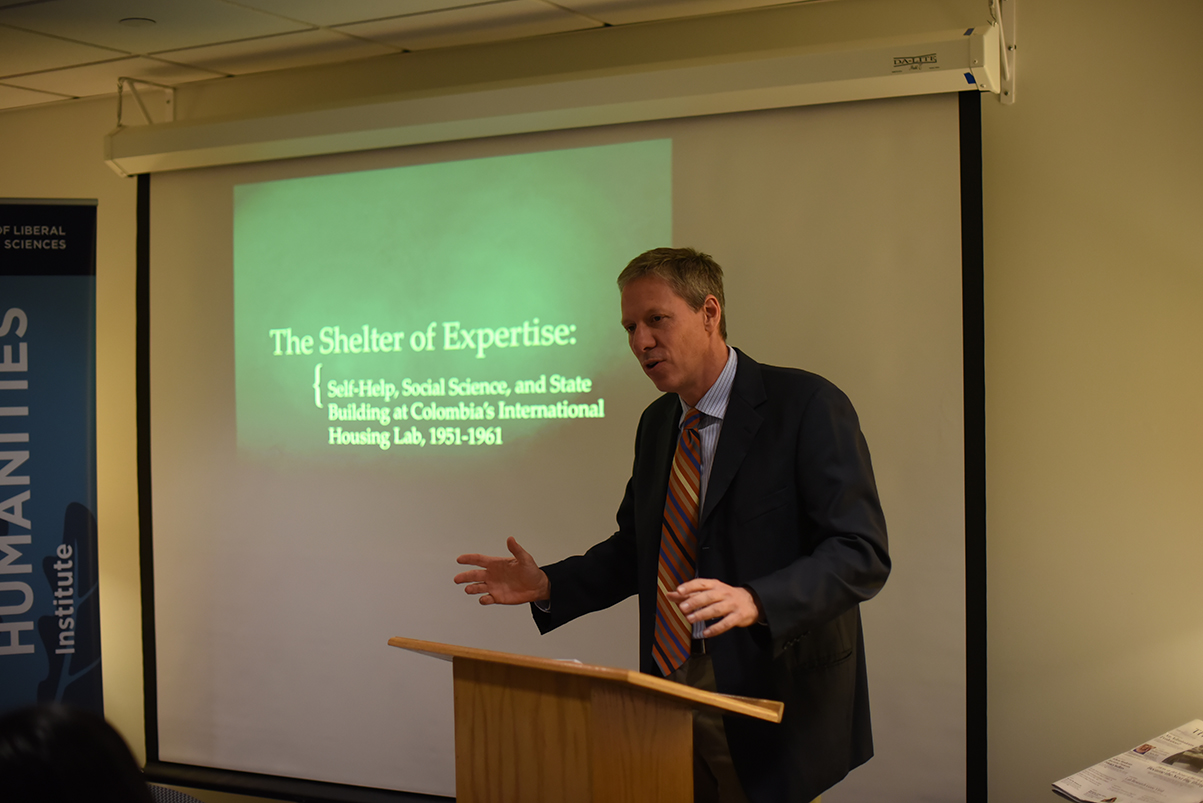 Mark Healey, assistant professor of history at the University of California, Berkley, presented on the large population shift from rural villages to urban centers in Colombia and how the country has modernized (Zhelun Lang/Daily Campus)