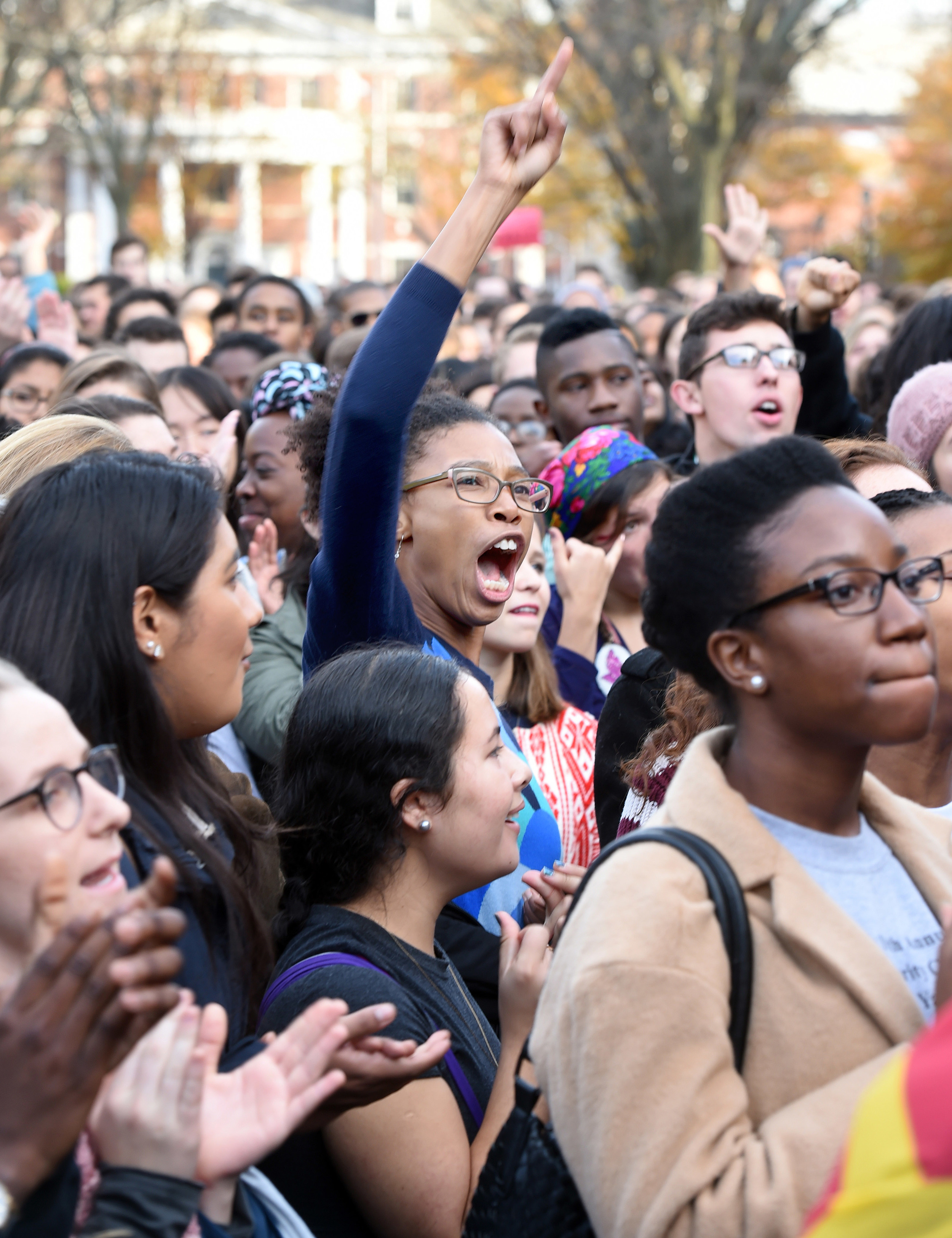 In this Nov. 9, 2015, file photo, Yale University students and faculty rally to demand that Yale University become more inclusive to all students on Cross Campus in New Haven, Conn. At schools including Michigan and Yale , students say the protests that led to the resignation of Missouri President Tim Wolfe are emboldening them to take a harder line. (AP)